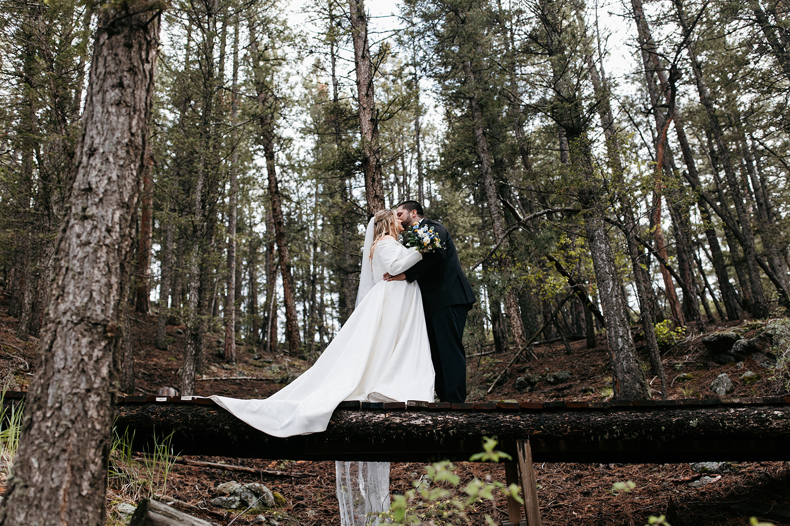 Katie & Scott forest micro wedding in Colorado at Juniper Lodge