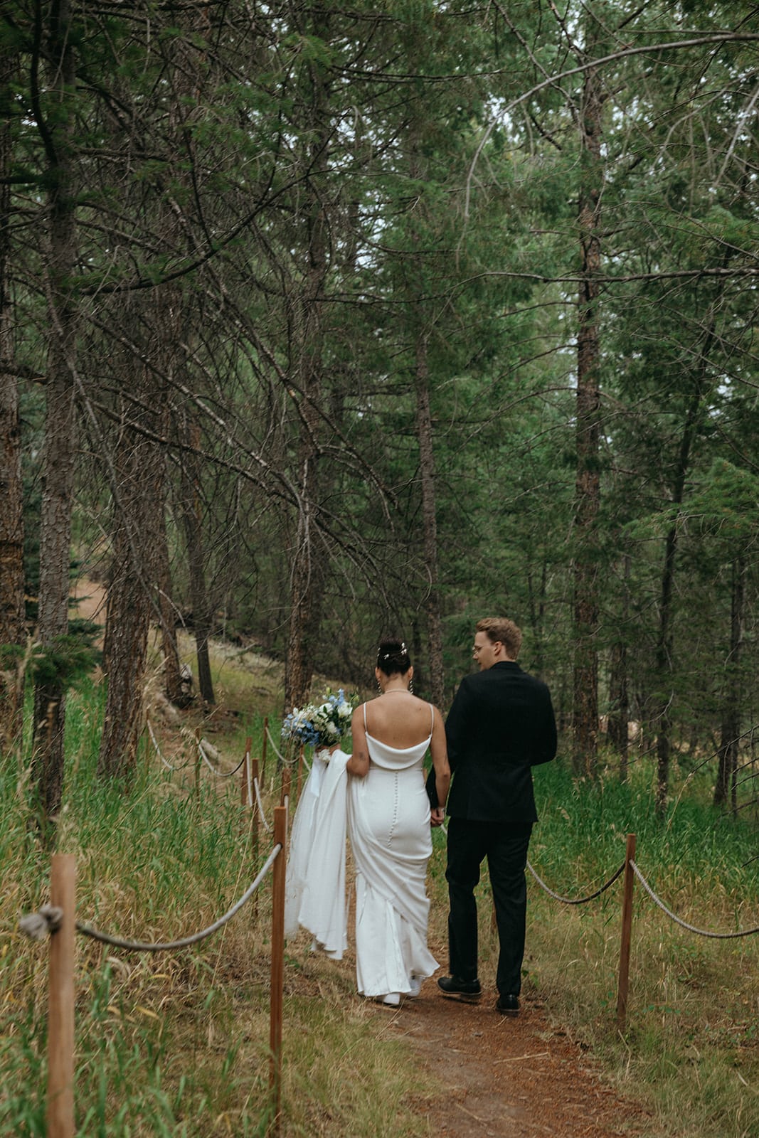 Couple portraits at Juniper Lodge during Evergreen mountain wedding.