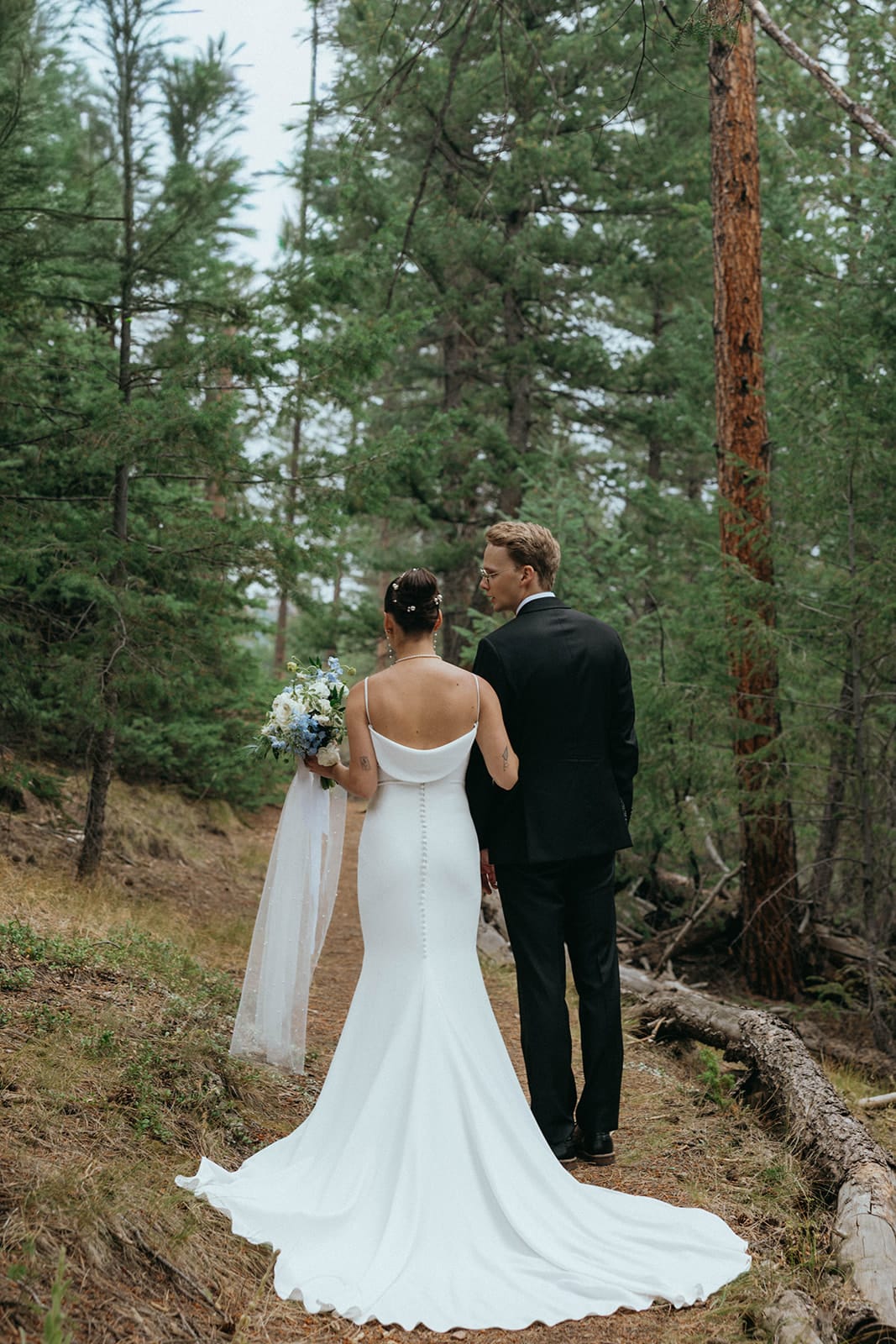 Couple portraits at Juniper Lodge during Evergreen mountain wedding.