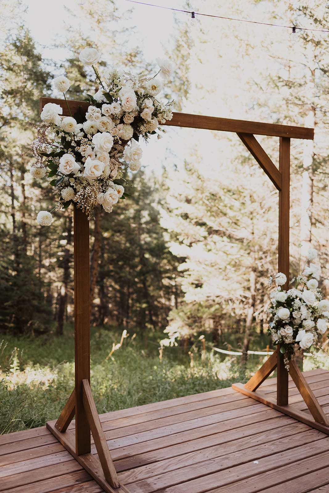 Golden-hour meadow ceremony at Evergreen wedding at Juniper Lodge & Treehouses.