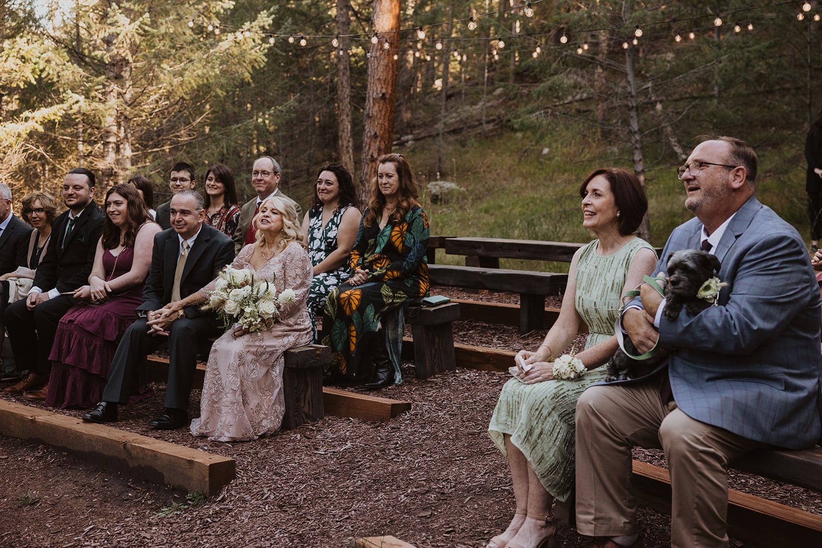 Golden-hour meadow ceremony at Evergreen wedding at Juniper Lodge & Treehouses.