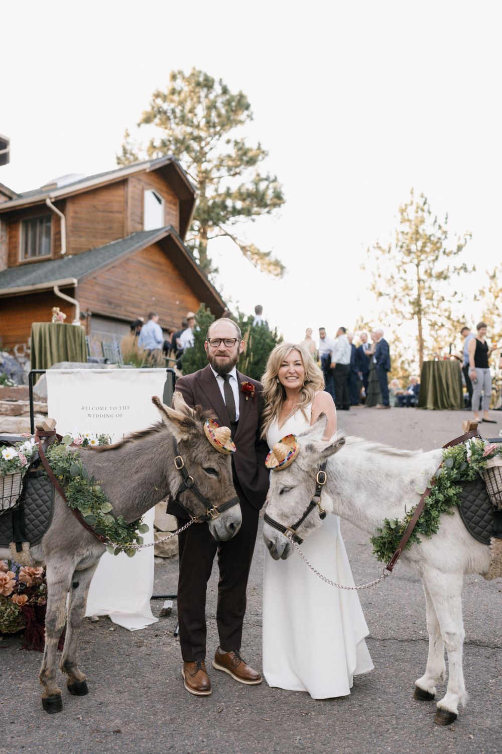 Cathy Lee & Cody with Rocky Mountain Beverage Burros at their wedding at Juniper Lodge & Treehouses in Evergreen, CO.