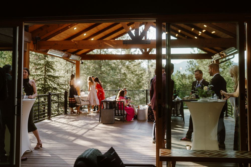 Eva & Dan's casual cocktail hour at Juniper Lodge & Treehouses after their spring Colorado mountain ceremony.