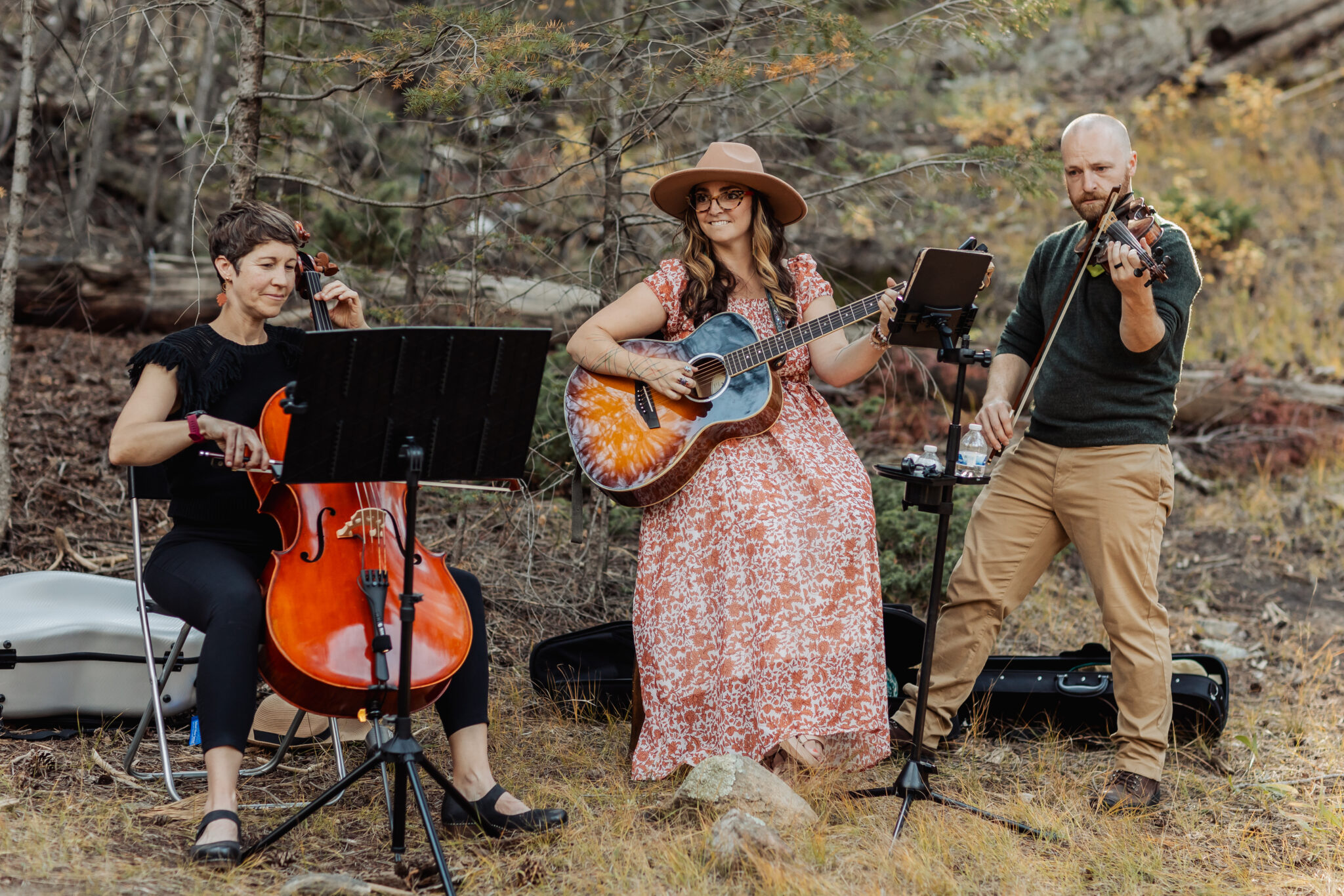 Hummingbirds & the Spoon, led by Alexa Kilgore, playing acoustic music at Juniper Lodge & Treehouses in Evergreen, Colorado.