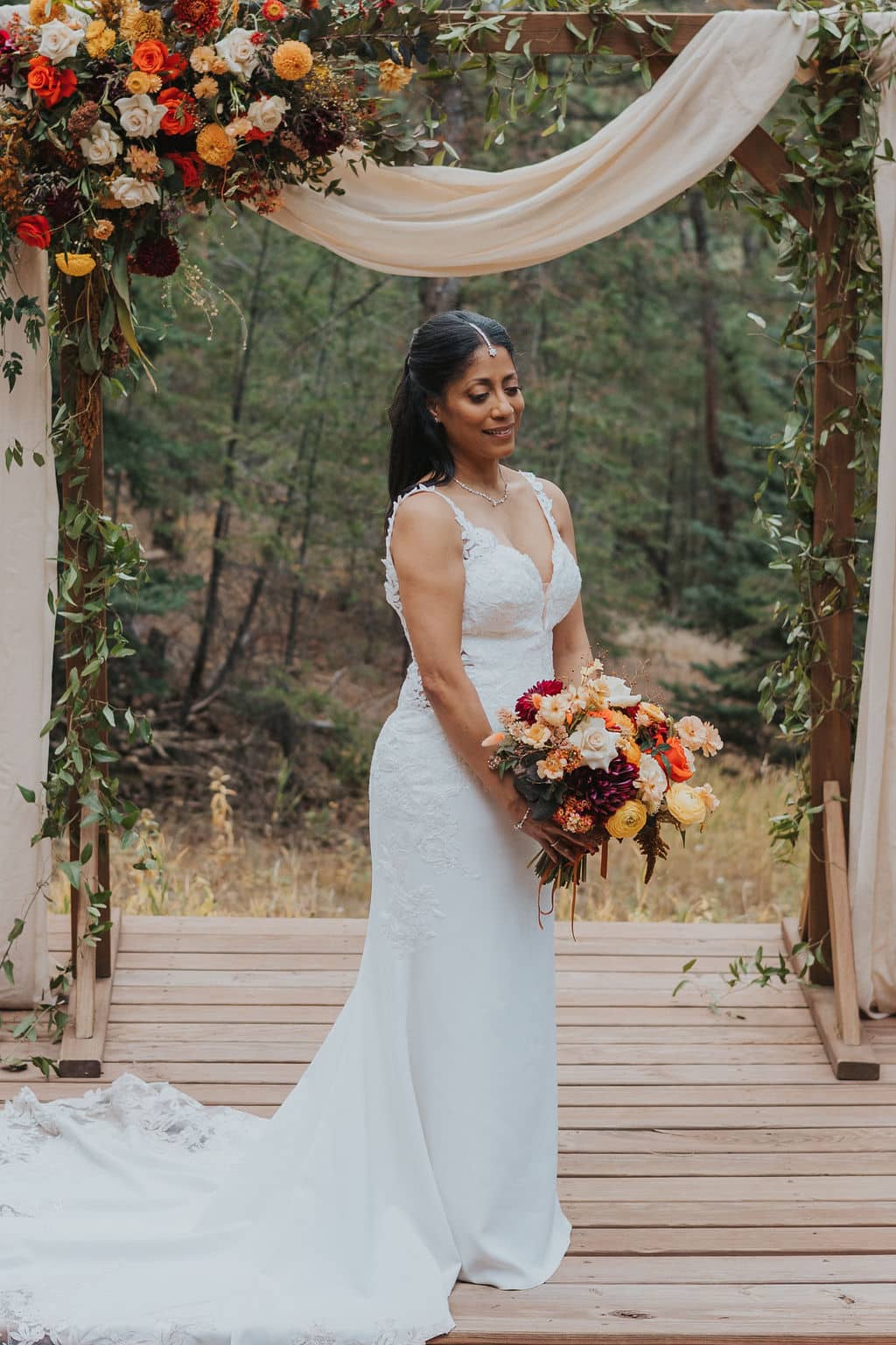 Bride portrait in fall foliage at Juniper Lodge & Treehouses.