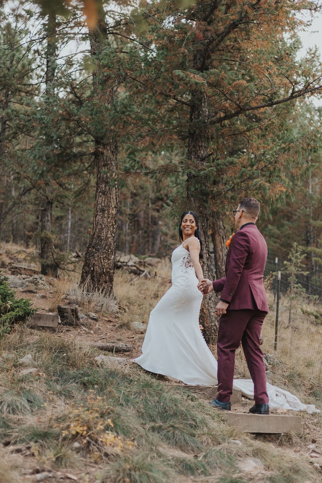 Couple portraits in fall foliage at Juniper Lodge & Treehouses.
