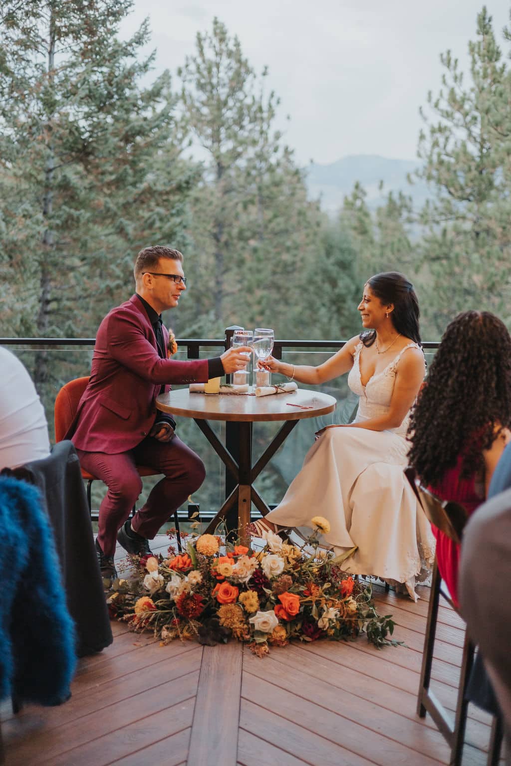 Dinner and dancing on the Mountain View Deck during Evergreen autumn wedding.