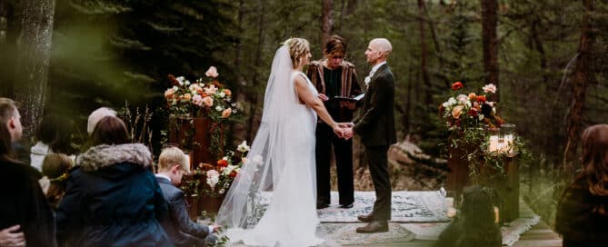 Romantic forested wedding for Theresa & Ryan at Juniper Lodge & Treehouses in Evergreen, CO.