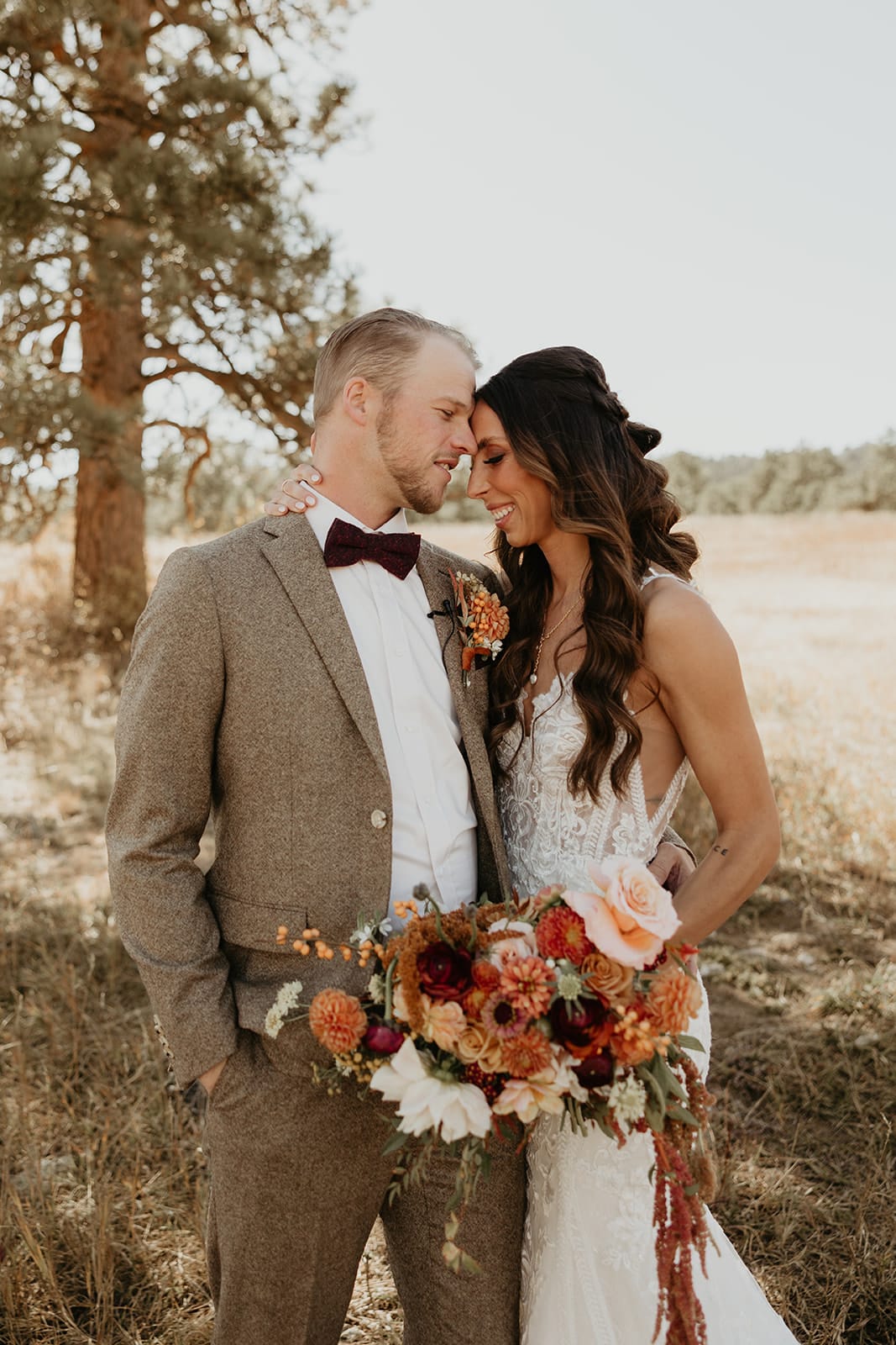 Bride and groom first look at Elk Meadow during Evergreen fall wedding at Juniper Lodge & Treehouses.