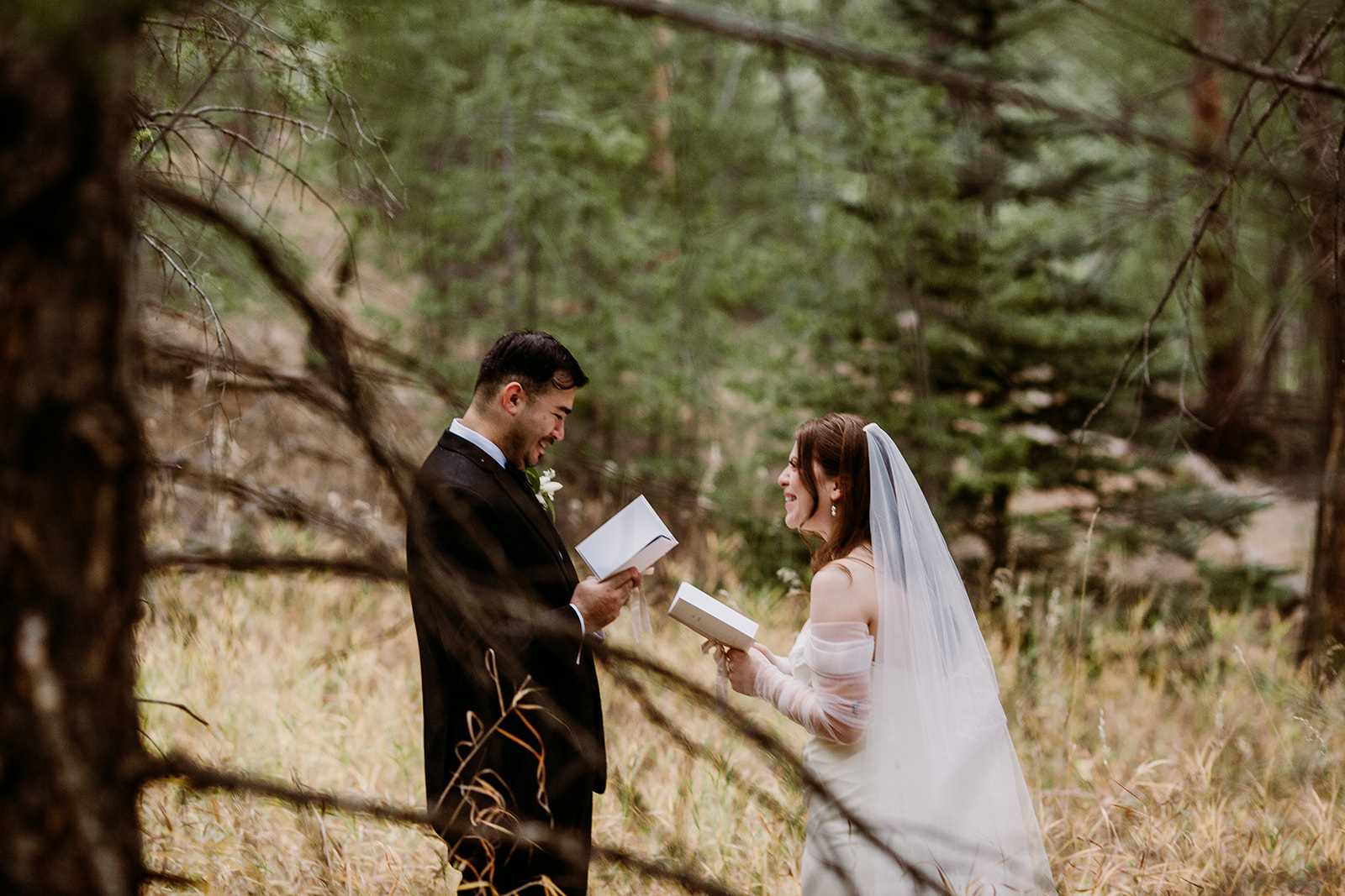 Couple’s portraits in the trees at Juniper